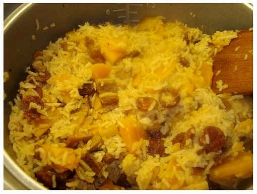 Chinese Squash Sausage Belly Rice Cooked in Rice Cooker.